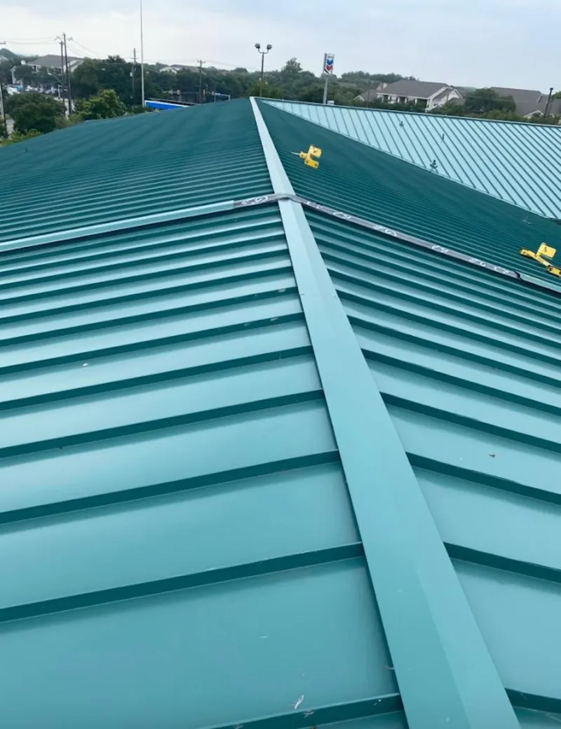 Green commercial metal roof ridge and valley for Metal Roof Repair in Seneca Falls